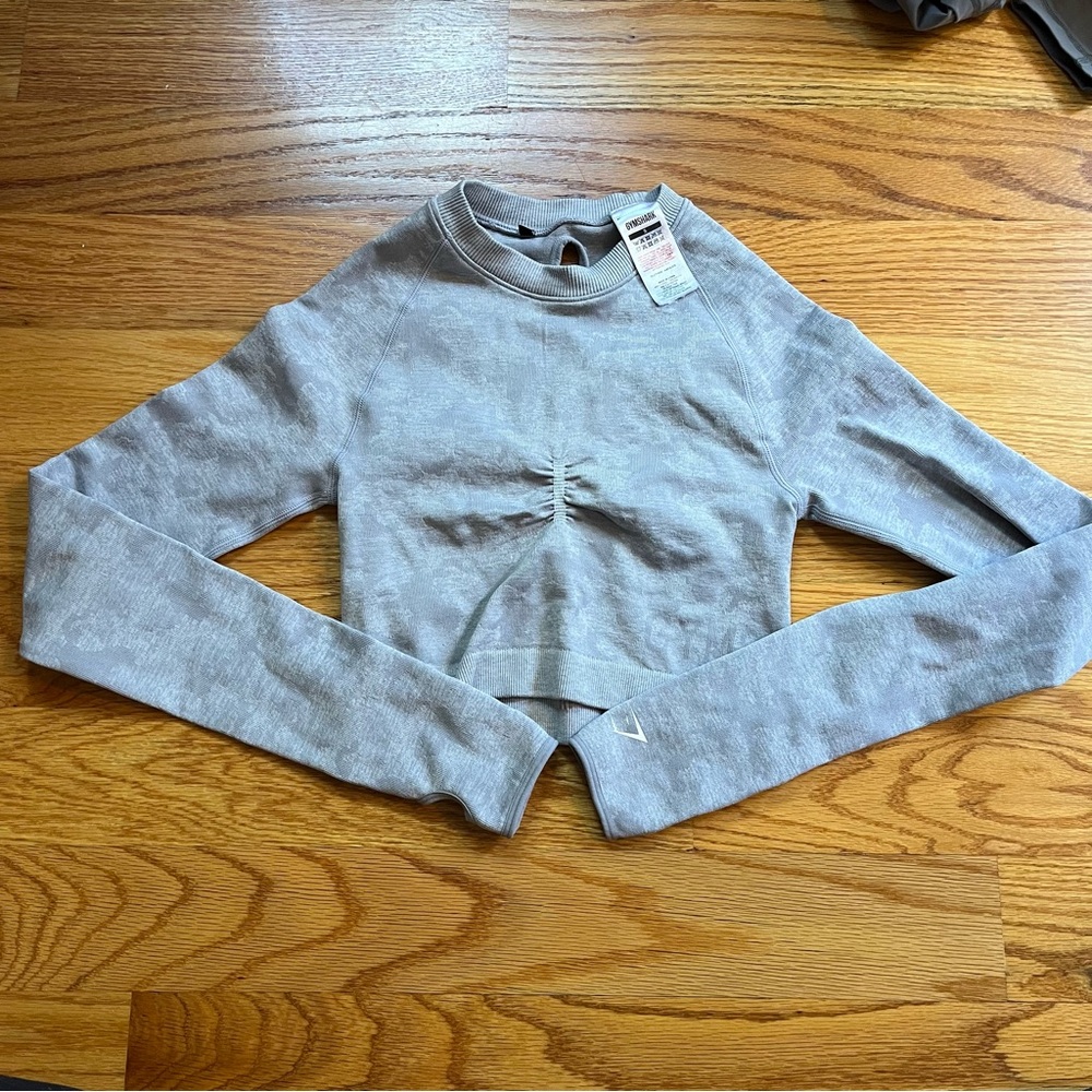 Gymshark long sleeve gray crop top with cutout back size small